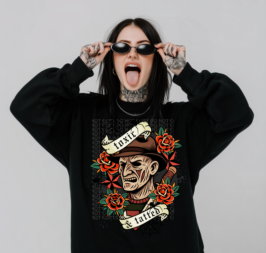 Tatted and Toxic Fred